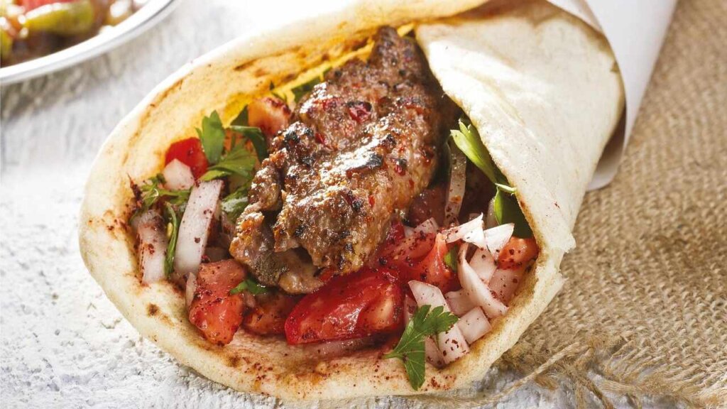 Turkish Kebab Traditional Spicy Kusadasi Food - Minced Meat Doner Wrap